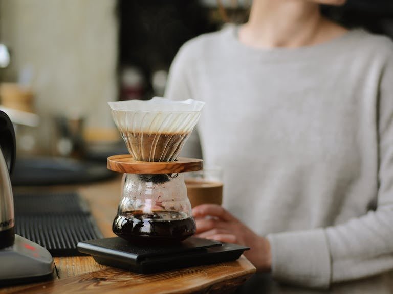 Brewing Coffee in the Clear Glass Cup