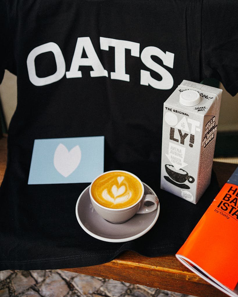 Coffee and Oat Milk on Table